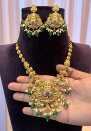 Beautiful short necklace with green beads and god Laxmi Devi motive