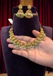 Beautiful short necklace with green stone and Laxmi Devi motive