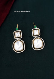 Beautiful earrings with green stone kundan stone