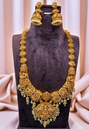 Traditional long nakshi haram with Laxmi Devi motive pendant and green beads