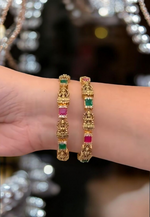 Load image into Gallery viewer, Beautiful bangles with goddess motive and green and Ruby stones

