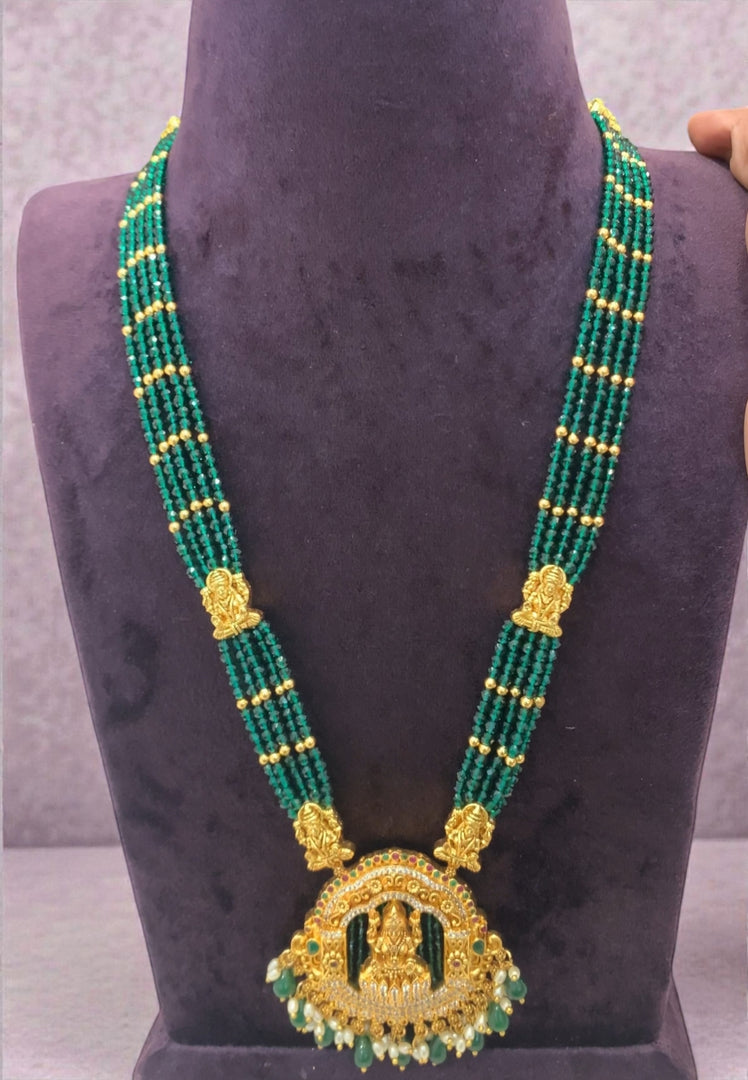Beautiful beads haram with green beads and Laxmi Devi motive pendant