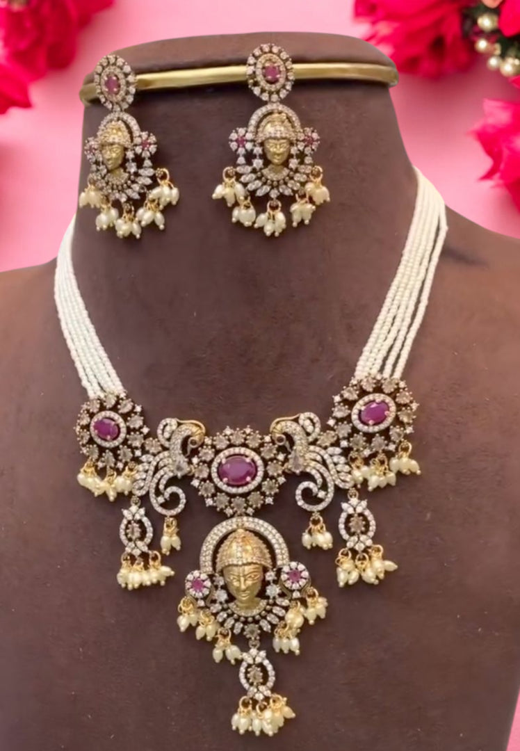 Beautiful pearls chain with pink stone and lord Venkateshwara swami locket