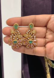 Beautiful victorian polish earrings with light pink stone