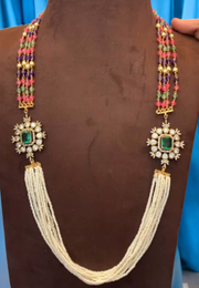 Fancy party wear necklace with coloured stones and diamond look pendant