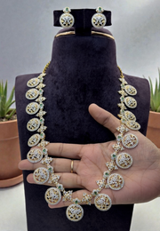 Beautiful gj polish bottumala design long haram with green stone