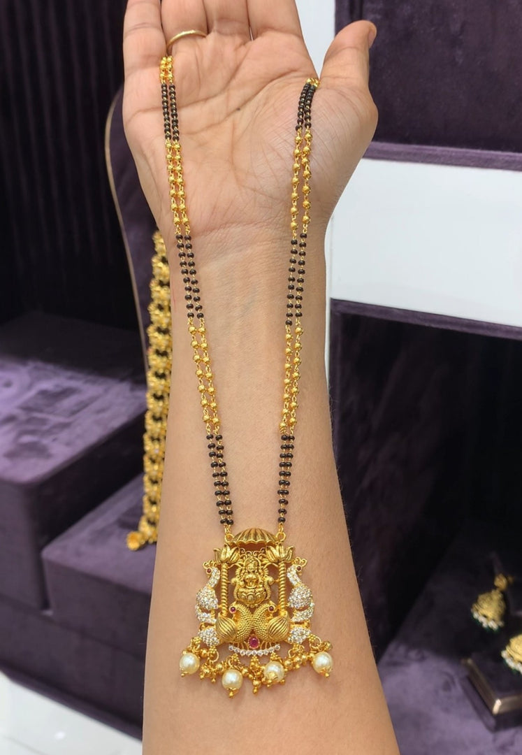 Beautiful black beads chain with Laxmi Devi motive pendant