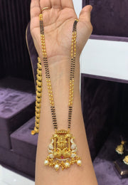 Beautiful black beads chain with Laxmi Devi motive pendant