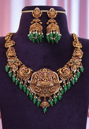 Beautiful short necklace with green beads and god Laxmi Devi motive