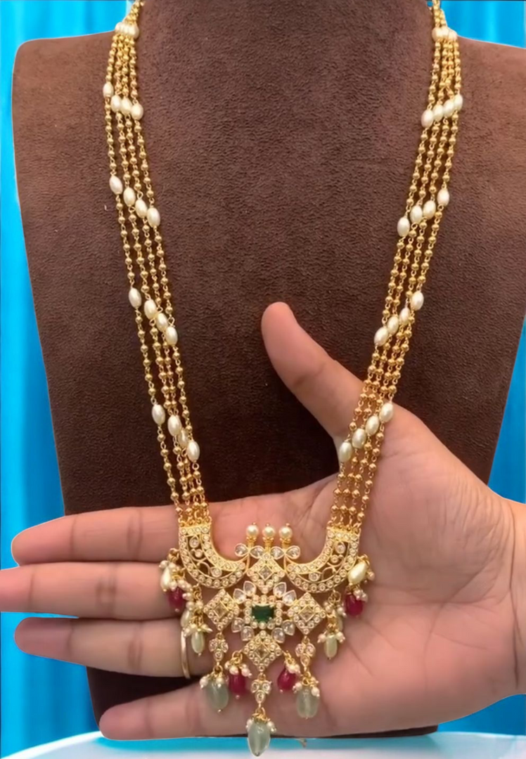 Beautiful long necklace with diamond look pendant