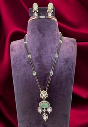 Beautiful two layer black beads with monalisa beads and green colour stone