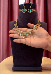 Simple party wear short necklace with green stone and uncut stone